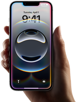 Una mano sostiene el iPhone 16e, ligero, colorido, con un resplandor a lo largo del borde de la pantalla